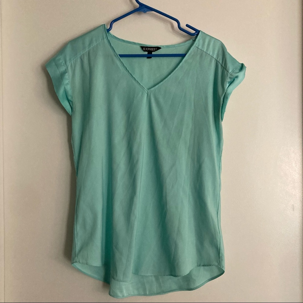 Turquoise blouse. Circle hem. Express. Small. Slight v neck